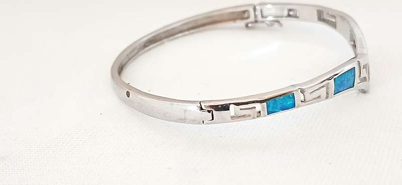 Sterling silver bangle with faux opals