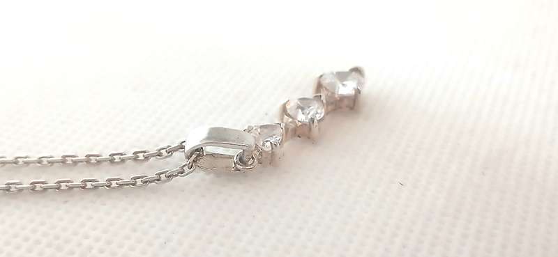 Sterling silver pendant with cubic stones on chain