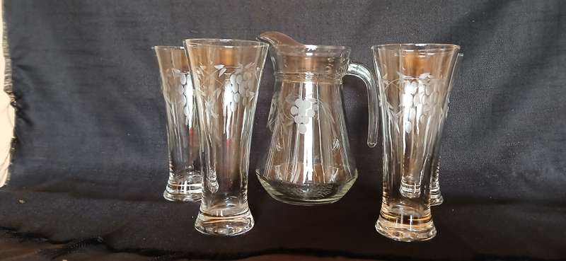 Vintage pitcher and glasses with etched grapes