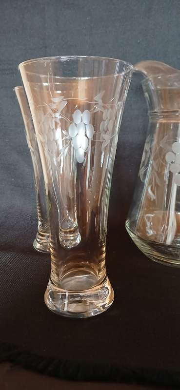 Vintage pitcher and glasses with etched grapes
