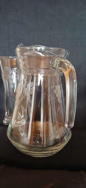 Vintage pitcher and glasses with etched grapes