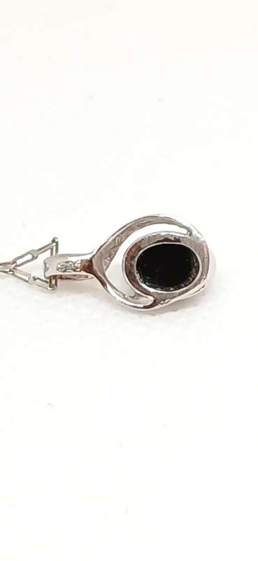 Sterling silver pendant with opal stone