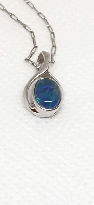 Sterling silver pendant with opal stone