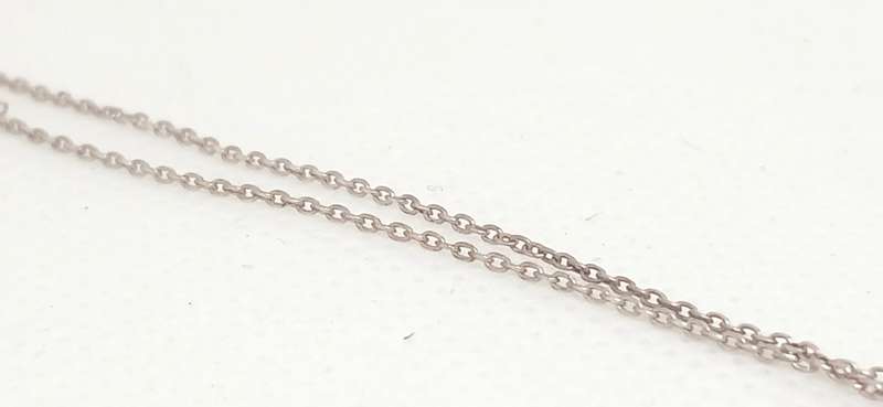 Sterling silver key pendant with cubic stone