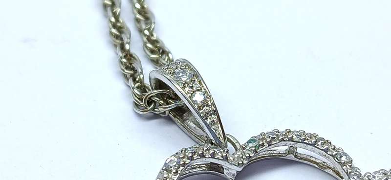 Sterling silver "rose' pendant on chain