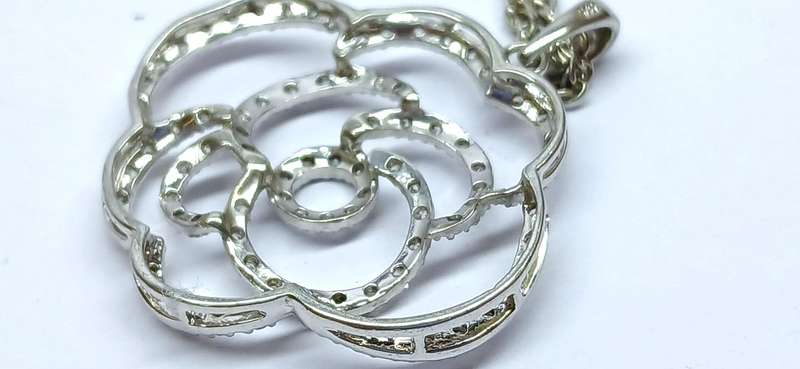 Sterling silver "rose' pendant on chain
