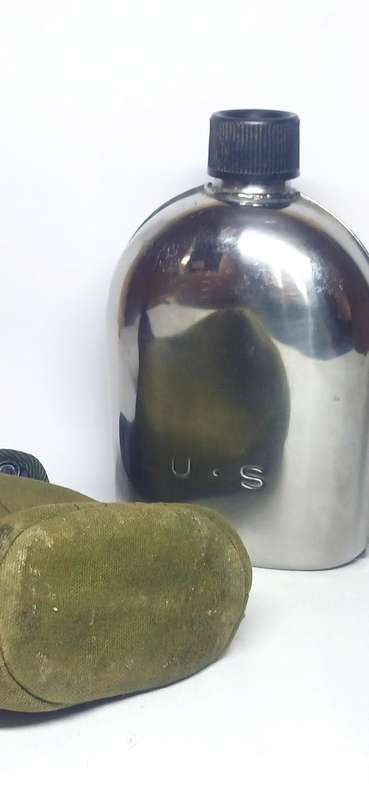 Vintage U.S military metal canteen with cover