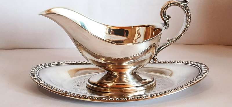 Vintage gravy boat and drip tray in silver plate