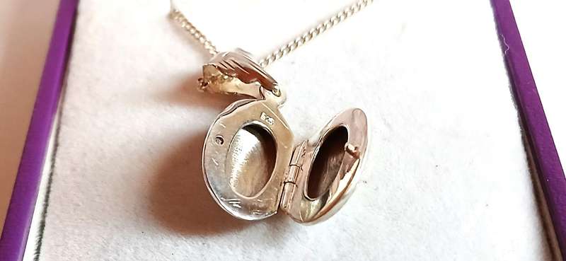Sterling silver small locket on chain