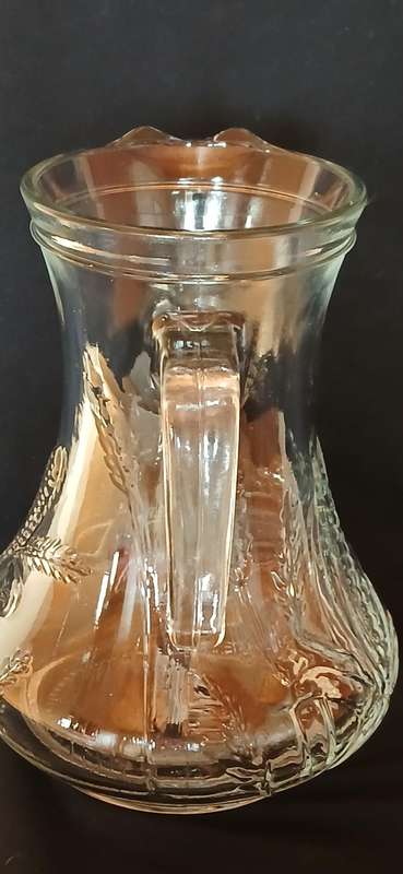 Vintage Italian embossed water pitcher
