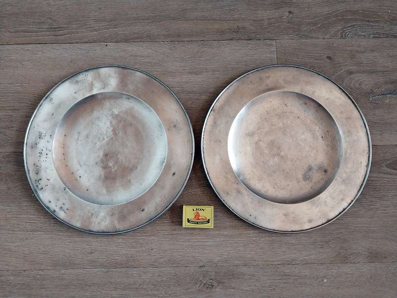 Two antique pewter plates made in Germany