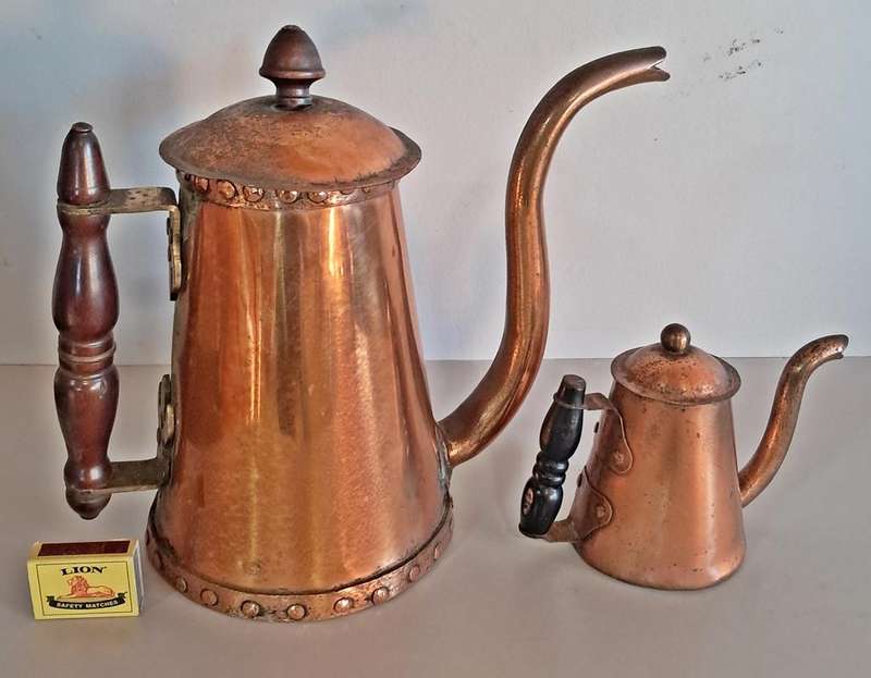 Pair of copper coffee pots