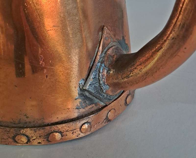 Pair of copper coffee pots