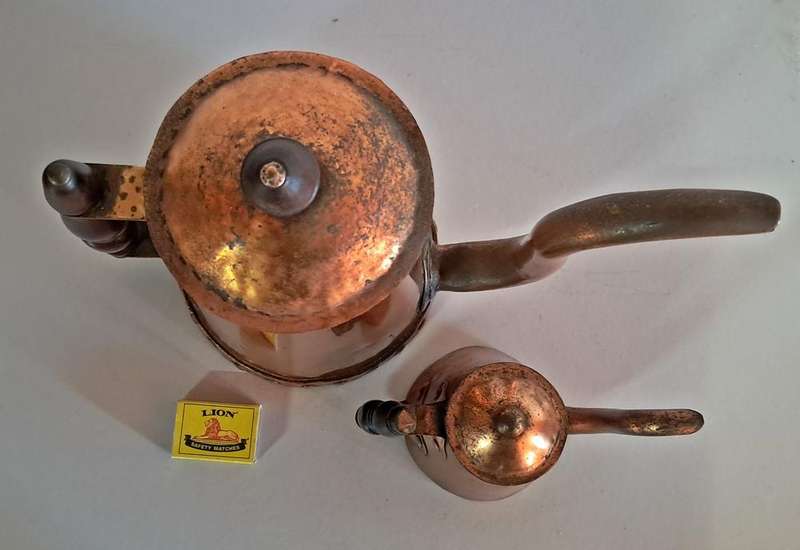Pair of copper coffee pots