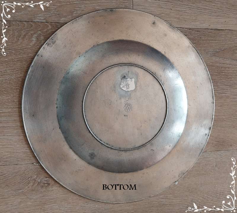 Two antique pewter plates made in Germany