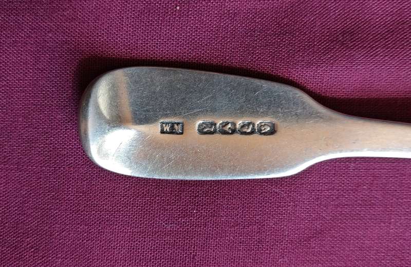 Solid silver dessert spoon by a Cape silversmith