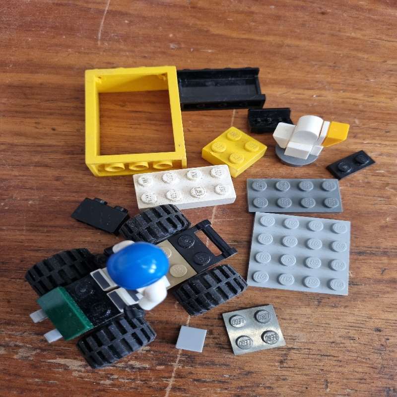 Small Lego car and lego pieces