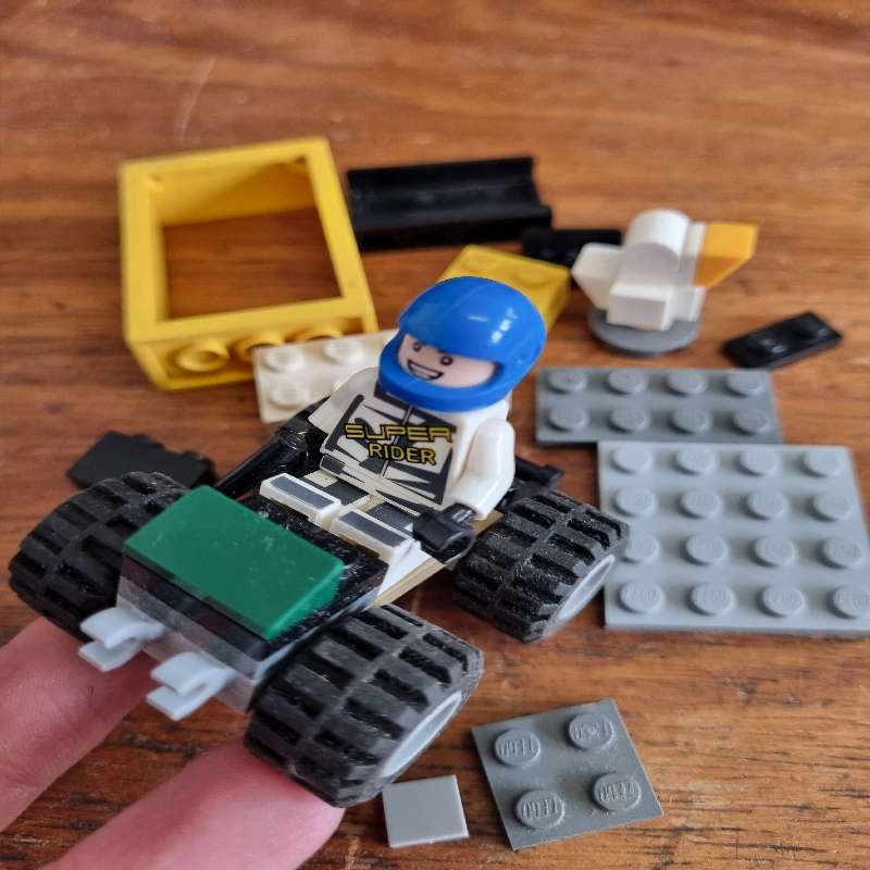 Small Lego car and lego pieces