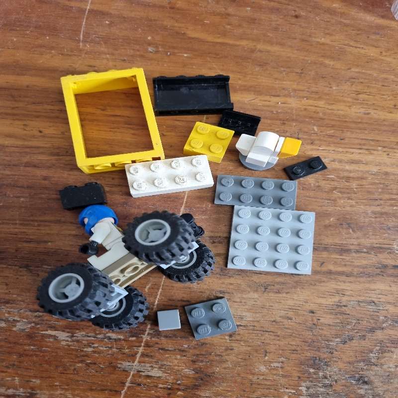 Small Lego car and lego pieces