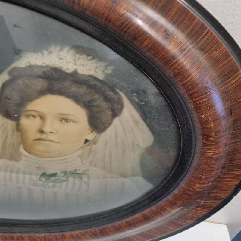 Large Vintage Oval Wooden Picture frame with curved glass and vintage photo