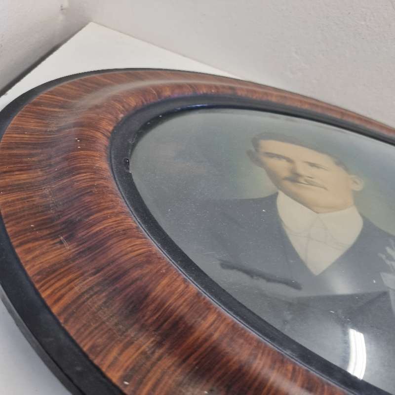 Large Vintage Oval Wooden Picture frame with curved glass and vintage photo