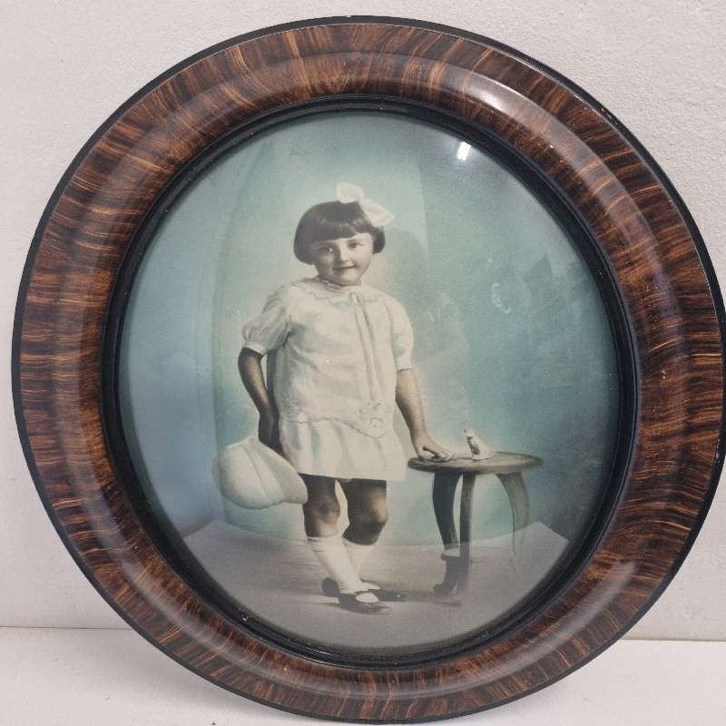 Large Vintage Oval Wooden Picture frame with curved glass and vintage photo