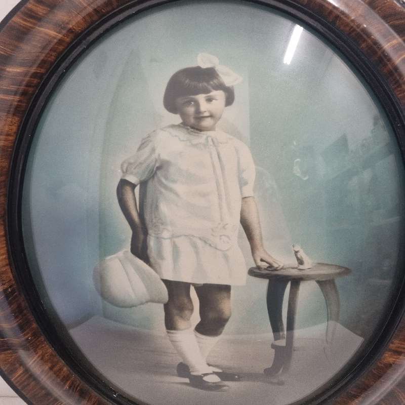 Large Vintage Oval Wooden Picture frame with curved glass and vintage photo
