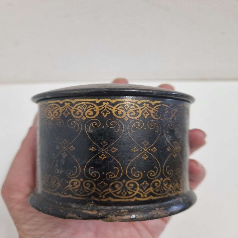 Vintage container with gold detail