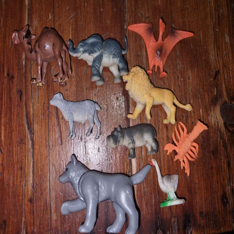 Plastic animals including elephant, lion, hippo
