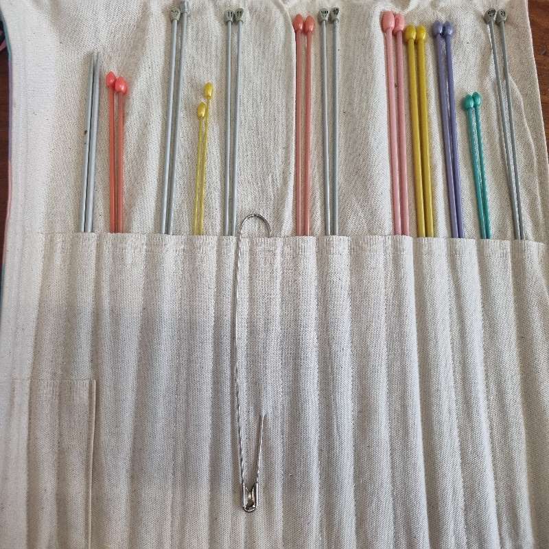 12 Pairs of Knitting needles in pouch