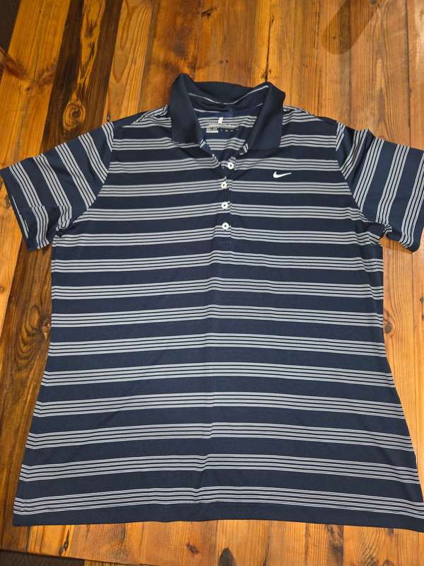 Nike golf Dri-fit T - Shirt Label says Size XXL but small fit. Would better fit a size L
