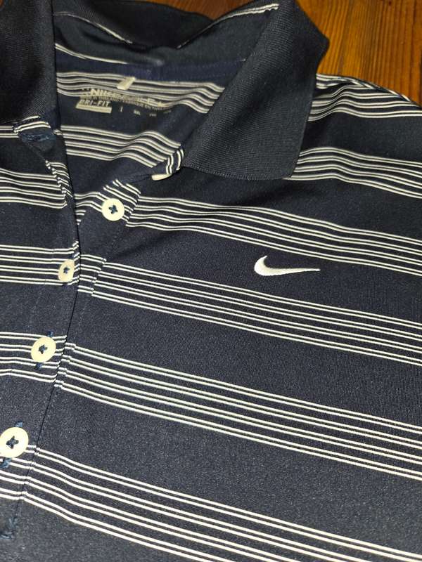 Nike golf Dri-fit T - Shirt Label says Size XXL but small fit. Would better fit a size L