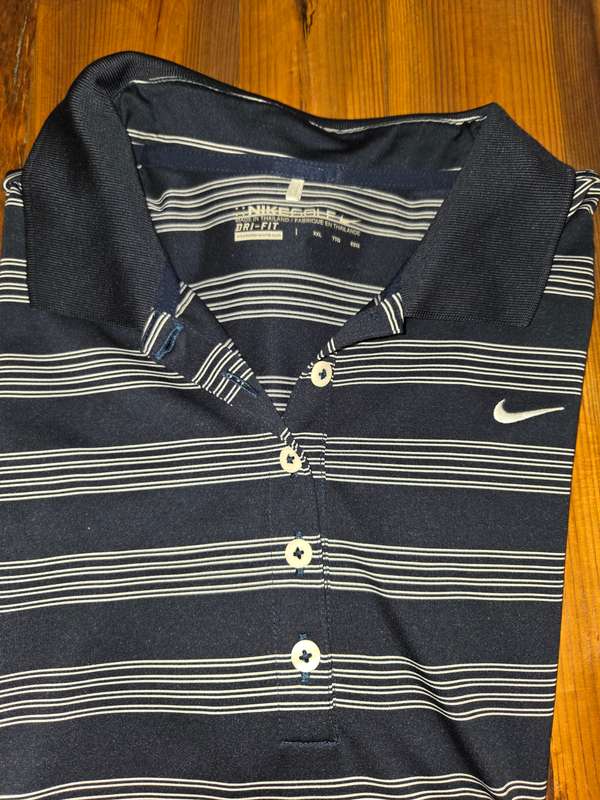 Nike golf Dri-fit T - Shirt Label says Size XXL but small fit. Would better fit a size L