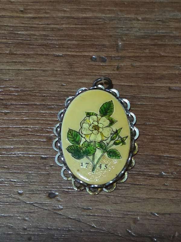 Vintage Pendant with floral detail and 1745 date