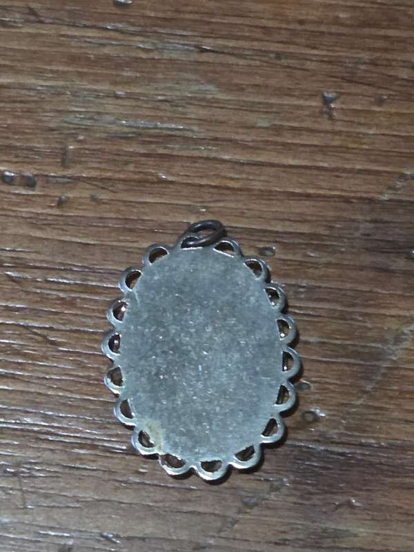 Vintage Pendant with floral detail and 1745 date