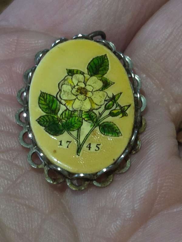 Vintage Pendant with floral detail and 1745 date