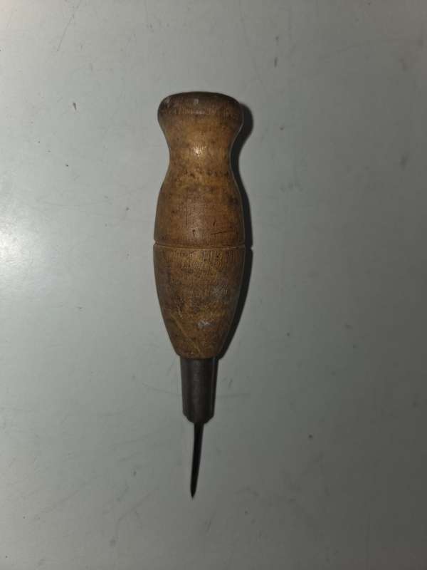 Vintage tool with wooden handle