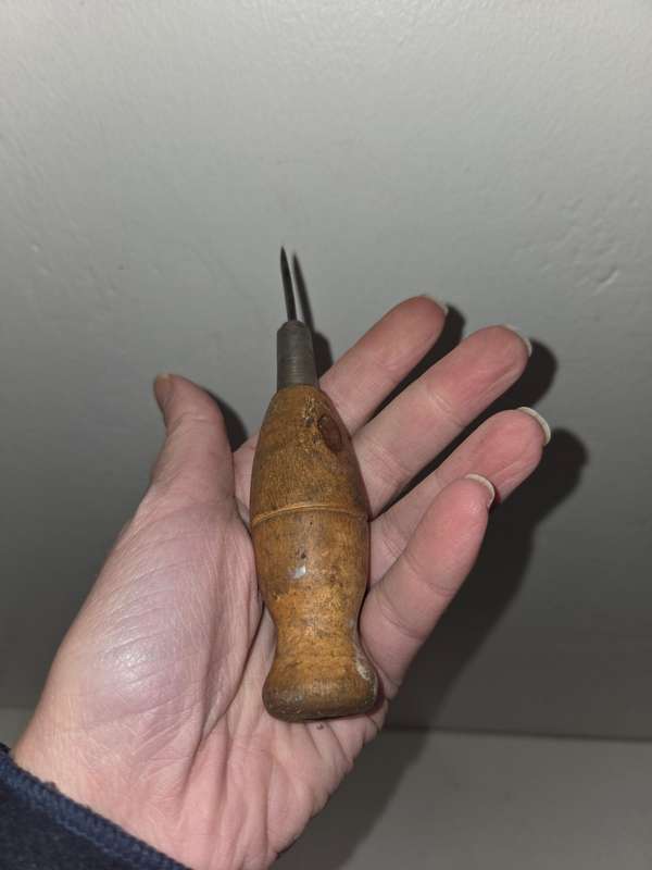 Vintage tool with wooden handle