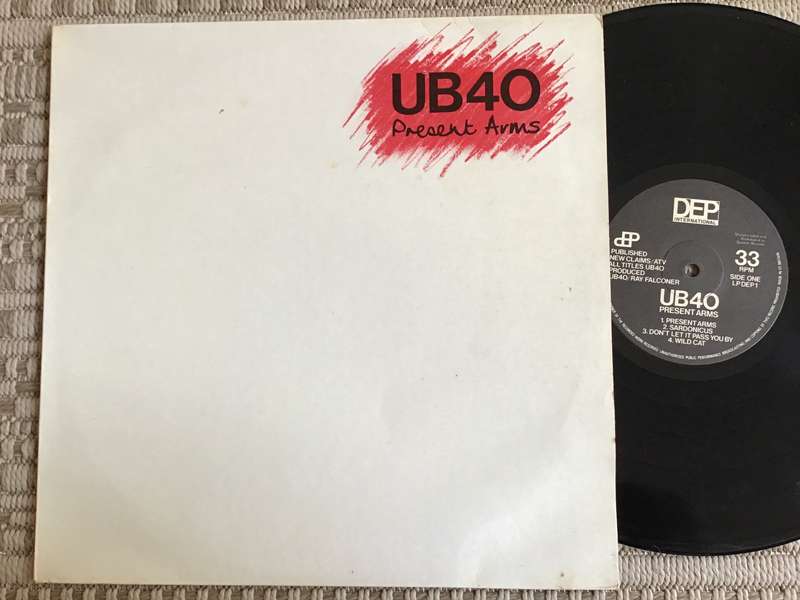 UB40 Present Arms Lp