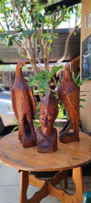 2 lovely statuesque eagles with the Chief wooden carvings.