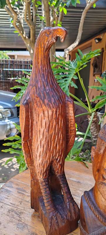 2 lovely statuesque eagles with the Chief wooden carvings.