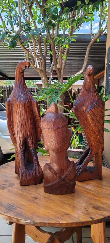 2 lovely statuesque eagles with the Chief wooden carvings.
