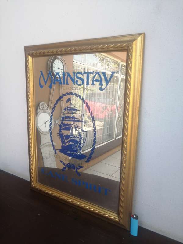 Beautiful, large Mainstay bar mirror.