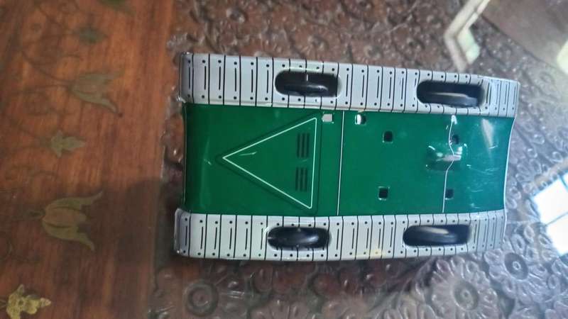 Tin Plate Military Toy Tank. Friction MF721 Moving Barrel. Made in China. Sells for over R2600.