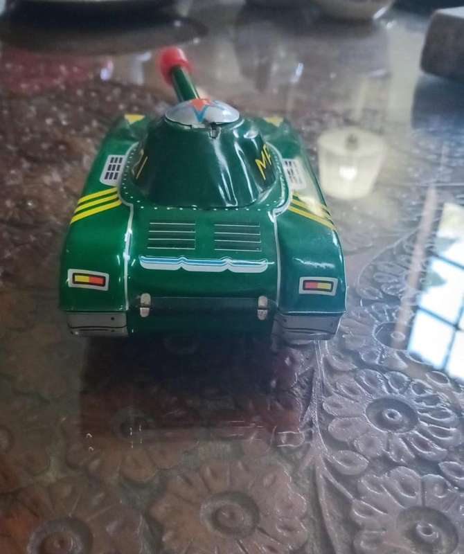 Tin Plate Military Toy Tank. Friction MF721 Moving Barrel. Made in China. Sells for over R2600.