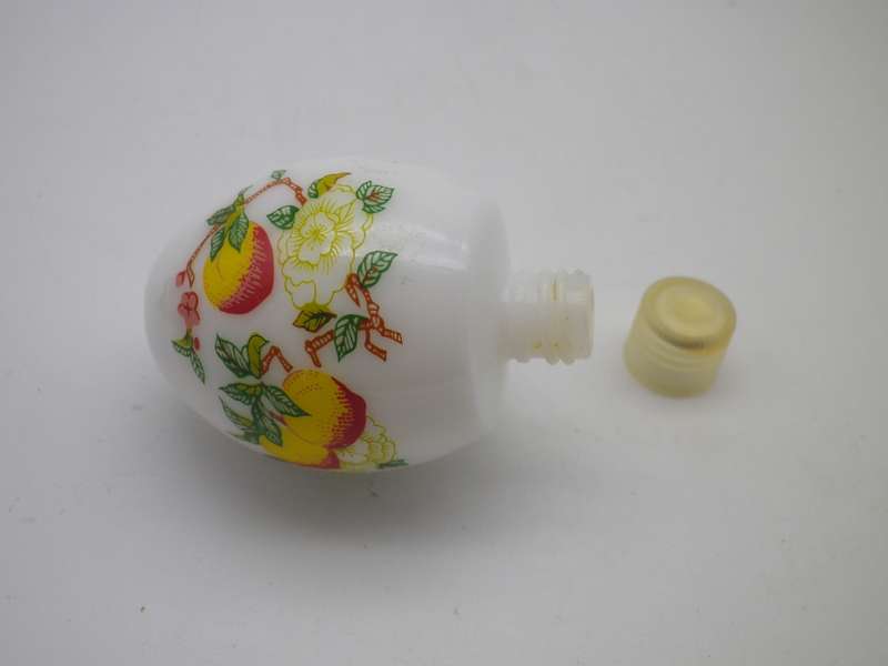 Vintage AVON, milk glass egg shaped perfume bottle.