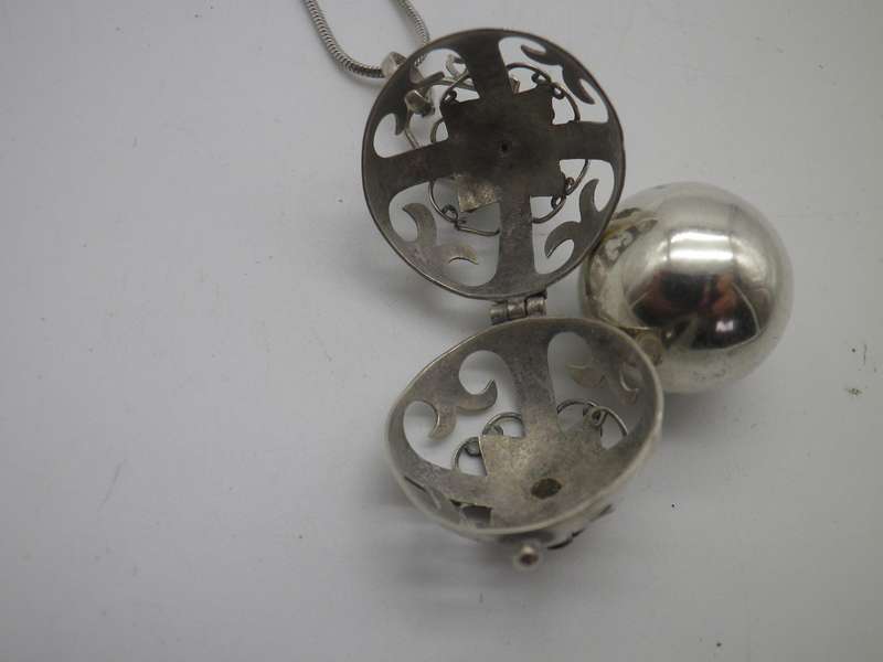 Sterling Silver Vintage Necklace - ball in cage on silver chain.