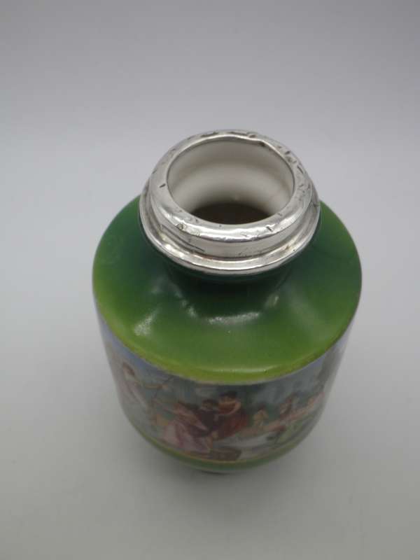 Antique Victorian porcelain vase with Hallmarked Silver rim. London 1910