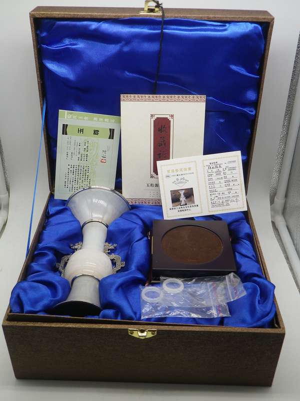 Fabulous Chinese loyal jade wine vessel, boxed with full paperwork.