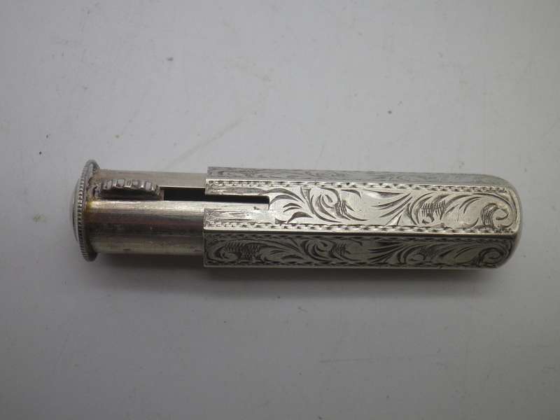 Hallmarked Silver (900 purity) Vintage lipstick holder.